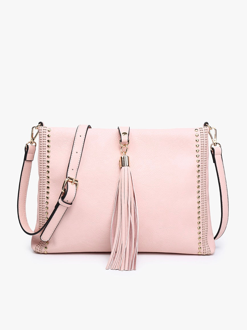 The Marie Crossbody With Grommet Detail and Tassel Light Pink