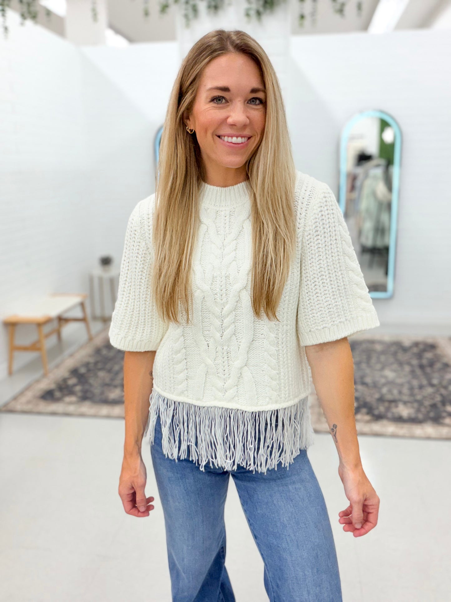 Feeling Famous Cable Knit Fringe Hem Sweater Cream